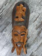 Tribal Masker Houtsnijwerk, Ophalen