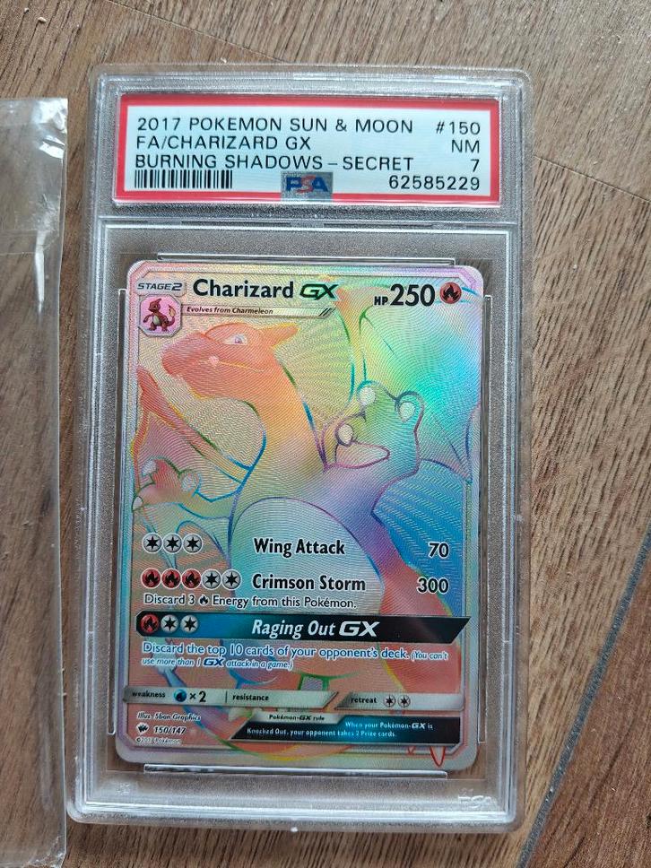 Charizard GX Rainbow Rare PSA 7 – Burning Shadows, Hobby en Vrije tijd, Verzamelkaartspellen | Pokémon, Zo goed als nieuw, Losse kaart