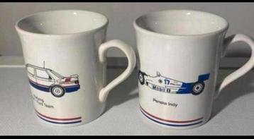 2 Mokken van Rallying Mobil 1 Ford Team en Penske Indy Mobil beschikbaar voor biedingen