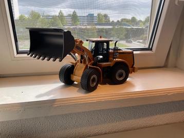 Speelgoed shovel op afstand bestuurbaar als nieuw beschikbaar voor biedingen