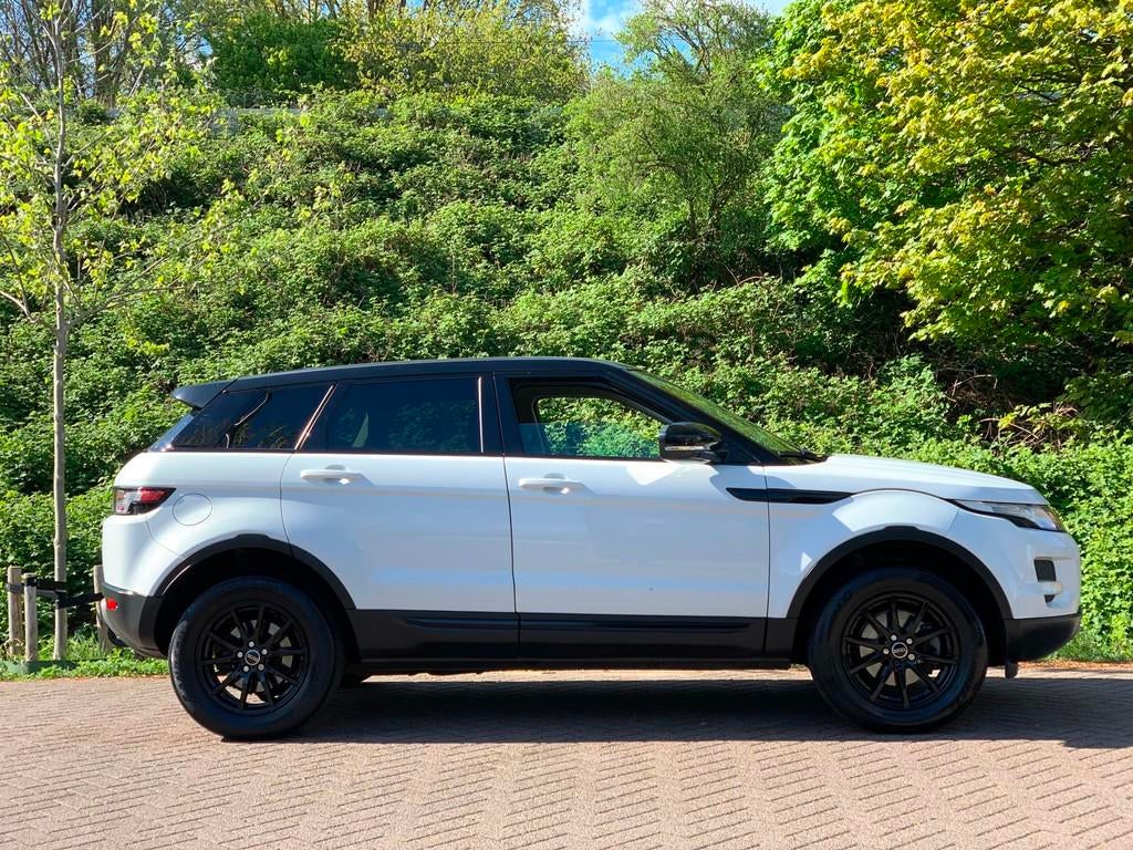 Land Rover Range Rover Evoque 2.2 TD4 4WD Prestige, Auto's, Euro 5, 150 pk, Wit, Leder