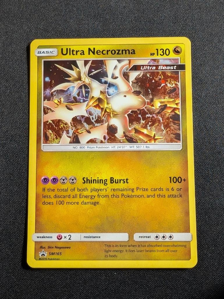 pokemon sun & moon promo holo ultra necrozma SM165, Ophalen of Verzenden, Zo goed als nieuw, Losse kaart, Foil