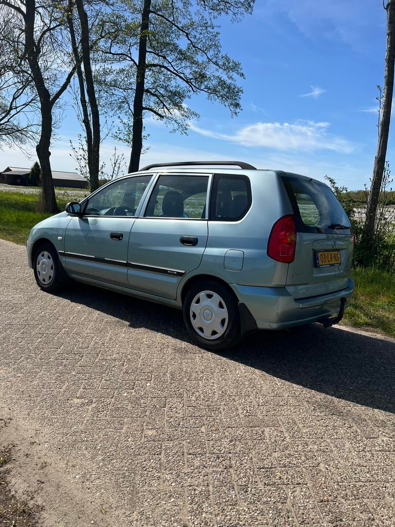 Mitsubishi Space Star 1.6 Family 2003 Grijs, Auto's, Mitsubishi, 4 cilinders, 1200 kg, Handgeschakeld, Particulier
