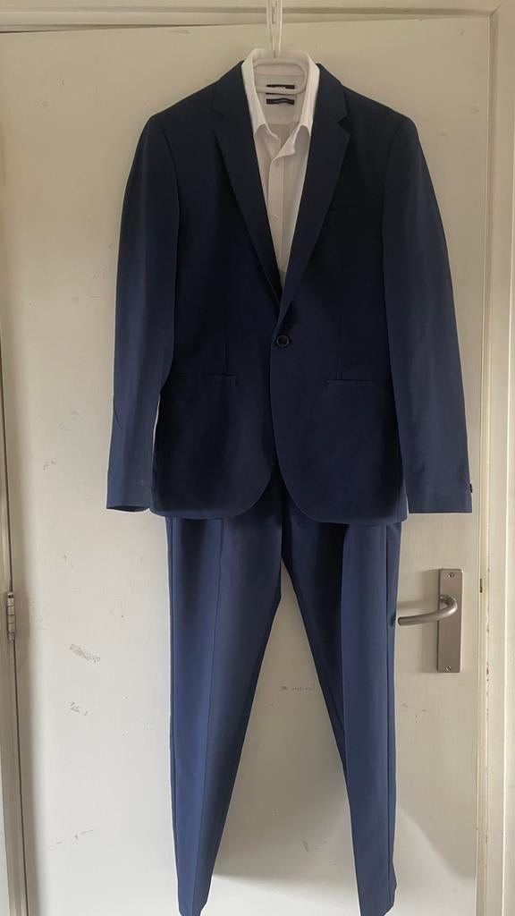 Jongenskostuum H&M blauw. Heren 44(xs). Bruidsjonker/galapak, Ophalen of Verzenden, Zo goed als nieuw, Maat 46 (S) of kleiner