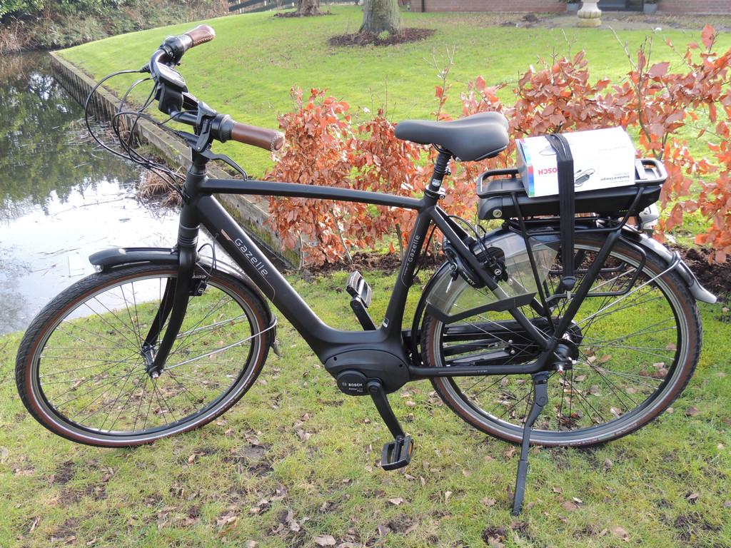 Gazelle Orange C8 HMB Framemaat 61 cm 500 WH accu, Wilhelminaweg 8
6951 bp  Dieren, NL, Gazelle, Info@gazelle.nl, Zo goed als nieuw