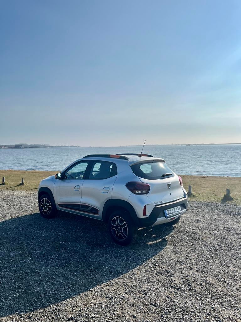 Dacia Spring Electric 25.000 km Trekhaak 1e €8900, Parkeersensor, Euro 6, Elektrisch, Grijs