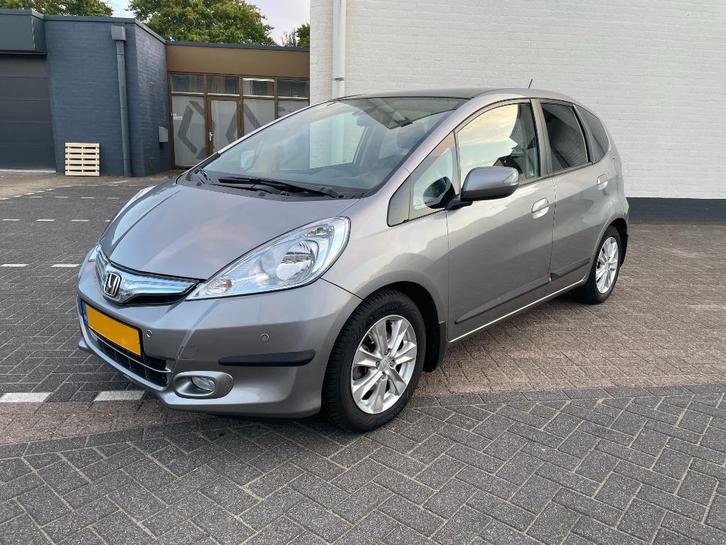 Honda Jazz 1.4 Hybr. Autom - 2011 - Grijs - LM velgen - Pano, Auto's, Honda, Particulier, Jazz, ABS, Airbags, Airconditioning