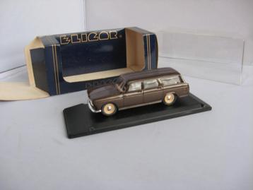 MERK ELIGOR  Peugeot 404 stationcar 1964.  Nieuw in doos. IS