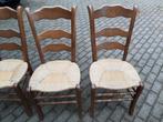 Vier houten stoelen met rieten zitting, Ophalen