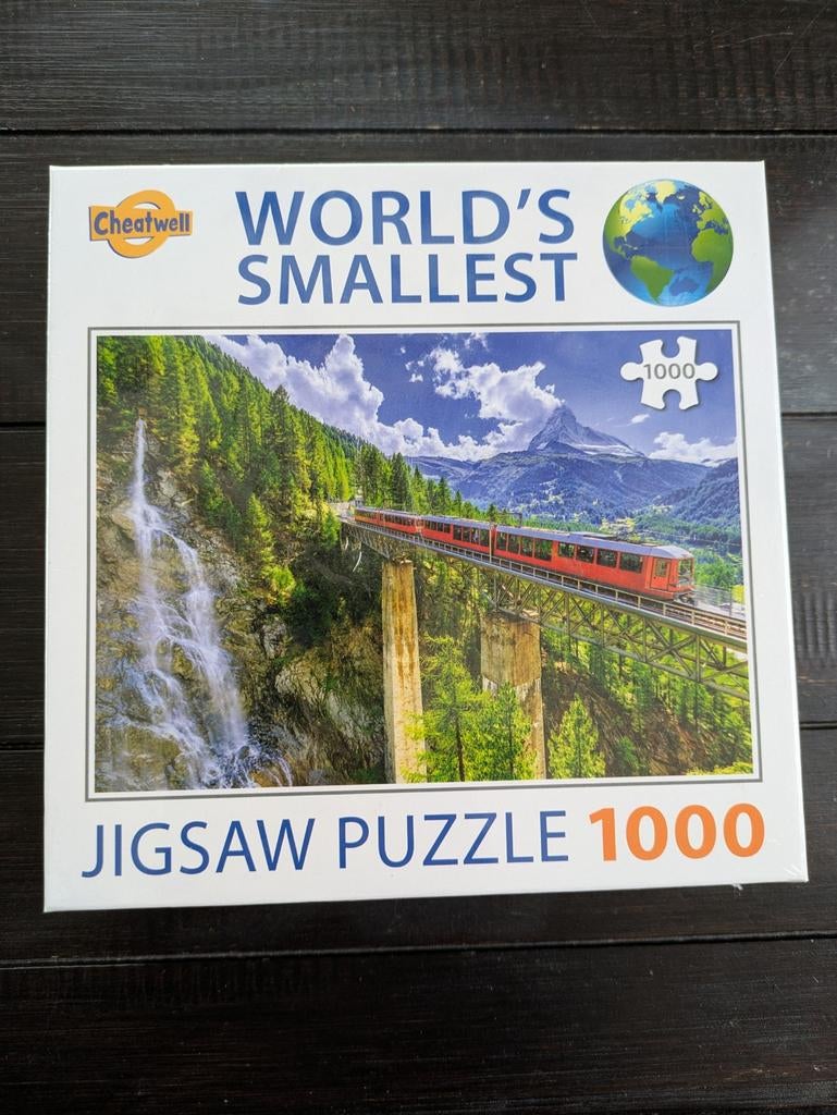 Wereld's Kleinste Legpuzzel - 1000 Stukjes, Hobby en Vrije tijd, Denksport en Puzzels, Ophalen of Verzenden, 500 t/m 1500 stukjes