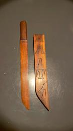 Houten zwaard en schede, Ophalen