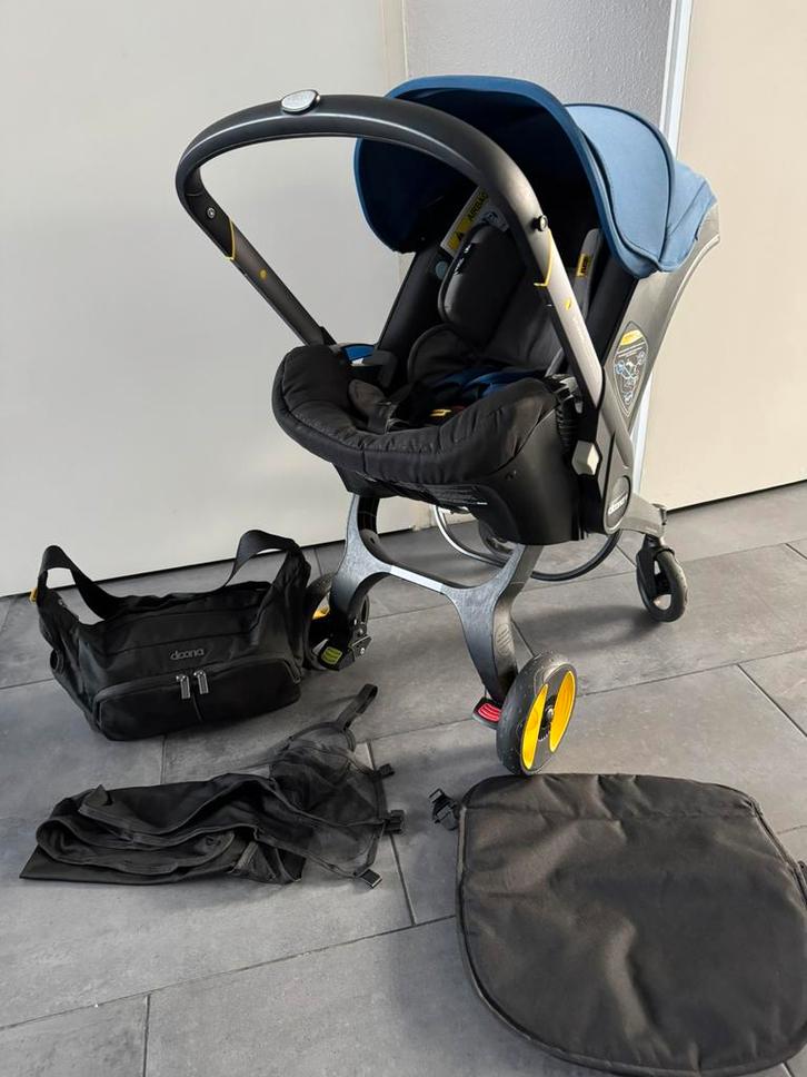 Doona autostoel & buggy in 1 met accessoires, Kinderen en Baby's, Autostoeltjes, Zo goed als nieuw, Maxi-Cosi, 0 t/m 13 kg, Autogordel of Isofix