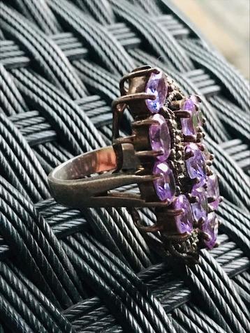 Zilveren ring met paarse steentjes en zirkonia’s Maat 17mm 