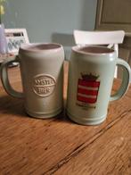 2 oude amstel bier pullen, 1960, plateel, Ophalen of Verzenden, Zo goed als nieuw