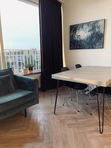 Betonlook eettafel metalen poten