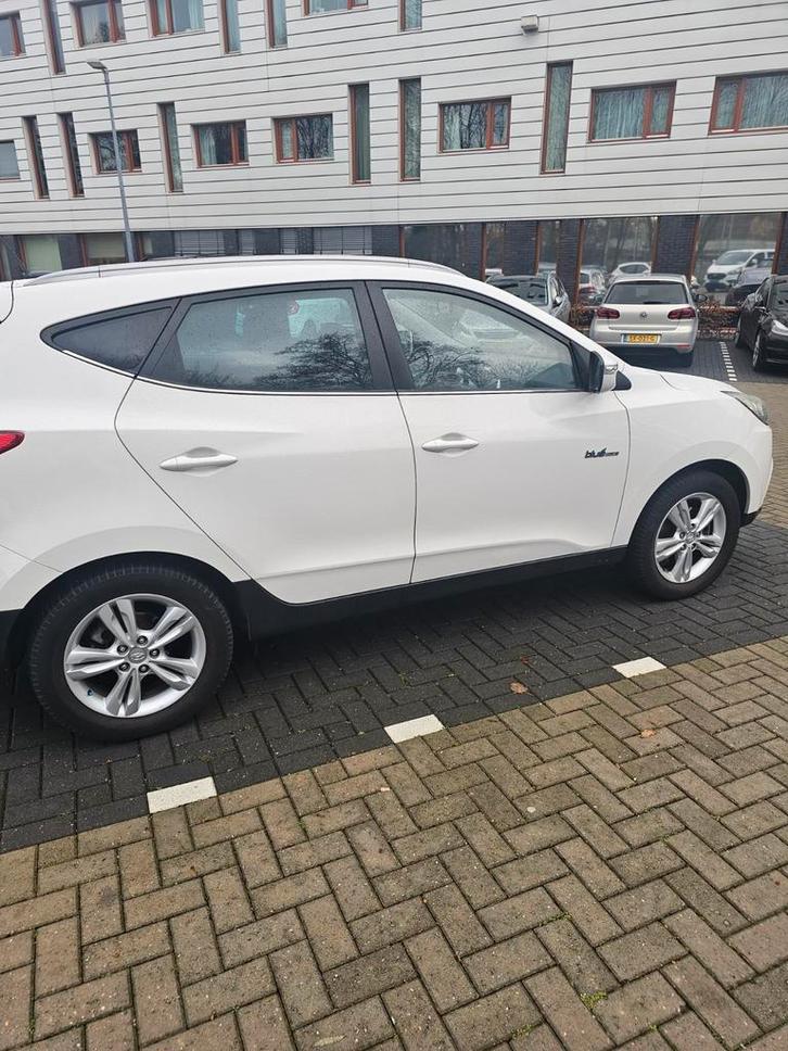 Hyundai iX35 1.6i GDI Blue 135pk 2012 Wit, Auto's, Hyundai, Particulier, iX35, ABS, Achteruitrijcamera, Airbags, Airconditioning