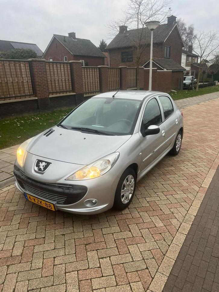 Peugeot 206+ 1.4 5D 2010 Grijs, Auto's, Peugeot, Particulier, 206+, Benzine, D, Hatchback, Handgeschakeld, Geïmporteerd, Zilver of Grijs
