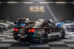 Nissan Skyline R34 GTR V-spec Midnight Purple II, Auto's, Stof, 2568 cc, Bedrijf, Handgeschakeld