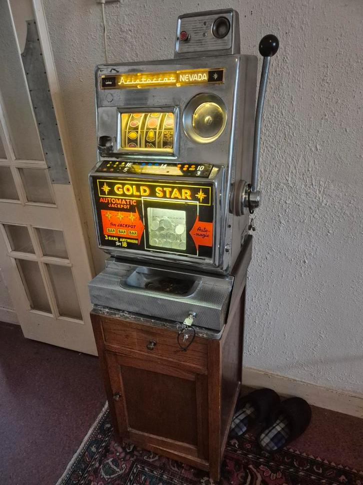 Aristocrat Goldstar slotmachine (18-5-1964), Verzamelen, Automaten | Gokkasten en Fruitautomaten, Gebruikt, Gulden, Met sleutels