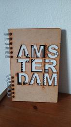 Komoni Amsterdam notitieboek, Verzenden