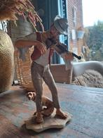 Muzikant met viool en hond beeldje, Ophalen