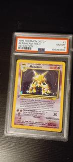 PSA 8 first edition Alakazam te koop., Ophalen of Verzenden, Nieuw, Losse kaart, Foil