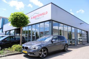 BMW 1-serie 118i Business+ AUT|Leder|Navi+|Cruise|Afn.trekh beschikbaar voor biedingen