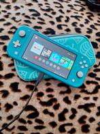 Nintendo Switch Lite Turquoise + Hoes & Games, Spelcomputers en Games, Spelcomputers | Nintendo Switch Lite, Ophalen of Verzenden