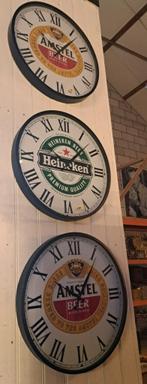 Mooie grote ronde metalen klok met biermerk 57 cm doorsnee, Ophalen, Zo goed als nieuw