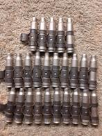 Hulzenband 25x 5,56mm zilverkleur €7,50 (ONKLAAR) ., Ophalen of Verzenden, Landmacht, Nederland, Hulzen of Bodemvondsten