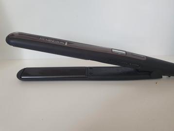 Remington Pro Sleek & Curl Stijltang (met veilogheidshoesje) beschikbaar voor biedingen