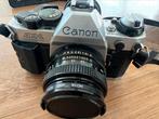 Canon AE-1 program camera met Sunpak flitser en wat lenzen, Audio, Tv en Foto, Fotocamera's Analoog, Ophalen of Verzenden, Gebruikt