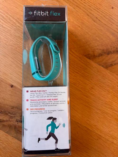 Mooie nieuwe Fitbit flex wristband, Sieraden, Tassen en Uiterlijk, Smartwatches, Nieuw, iOS, Blauw, Afstand, Waterdicht, Ophalen of Verzenden