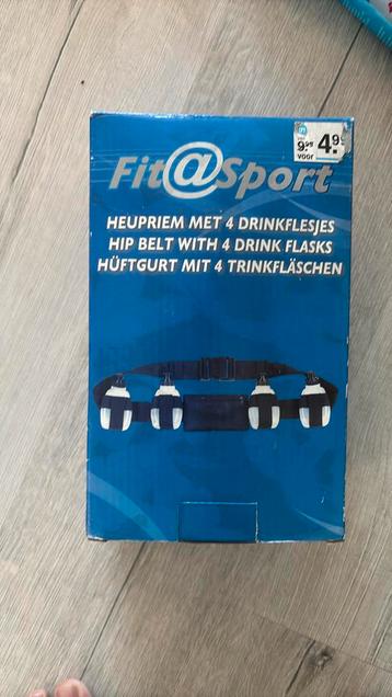 Heupriem met 4 flesjes  beschikbaar voor biedingen