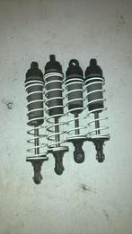 Traxxas Nitro sport schokbrekers, Gebruikt, Auto offroad, Ophalen of Verzenden, Schaal 1:10