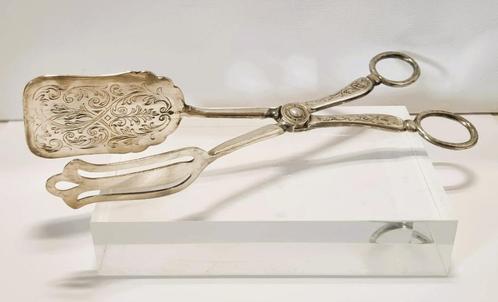 Verzilverde schep/tang met graveringen., Antiek en Kunst, Antiek | Bestek, Ophalen of Verzenden