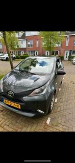 Toyota Aygo 1.0 12V Vvt-i Ddrs 2016 Grijs, Voorwielaandrijving, Stof, Zwart, 4 stoelen