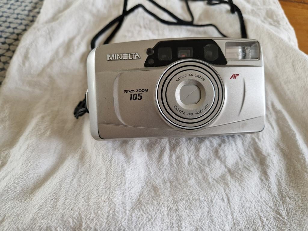 Oude Minolta fotocamera, Ophalen