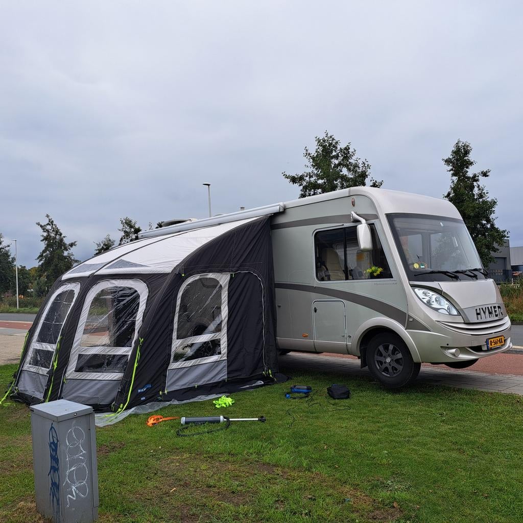 Opblaasbare Kampa voortent 390 breed . Met pomp en gordijnen, Ophalen of Verzenden