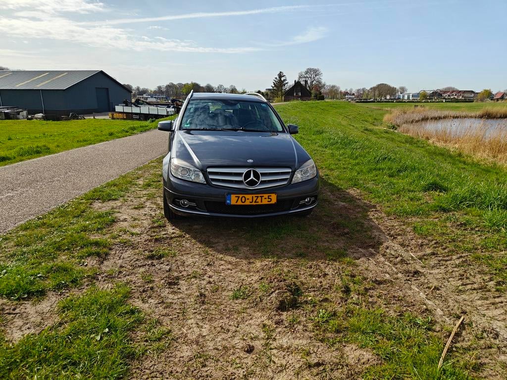 Mercedes-Benz C-Klasse 1.6 C180 Kompr. Estate 2009 Grijs, Achterwielaandrijving, Zwart, Leder en Stof, Handgeschakeld