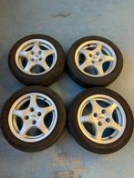 4x100 14 inch lichtmetalen velgen + all season banden 155/55, Ophalen