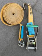 Gele spanband met ratel, REMA, Ophalen