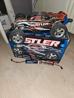 Traxxas Rustler met extra accu en wheeliebar., Elektro, Gebruikt, Auto offroad, Ophalen of Verzenden