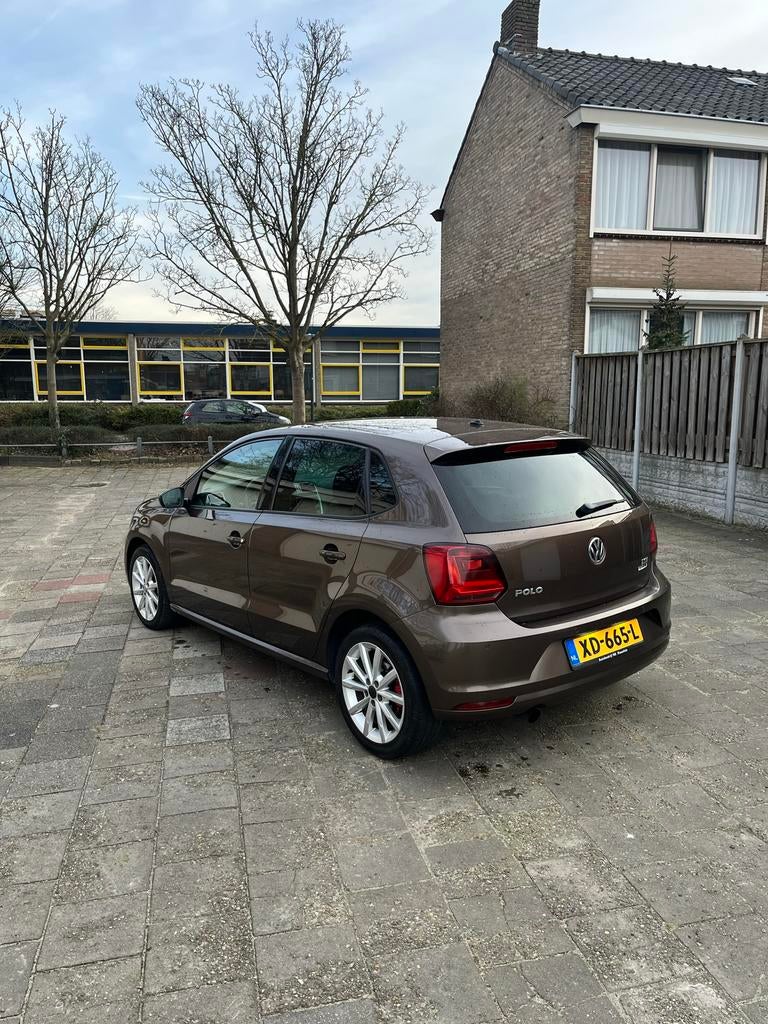 Volkswagen Polo 1.2 TSI 66KW DSG 2014 Bruin, Auto's, Volkswagen, 40 €/maand, 4 cilinders, Bruin, 1039 kg