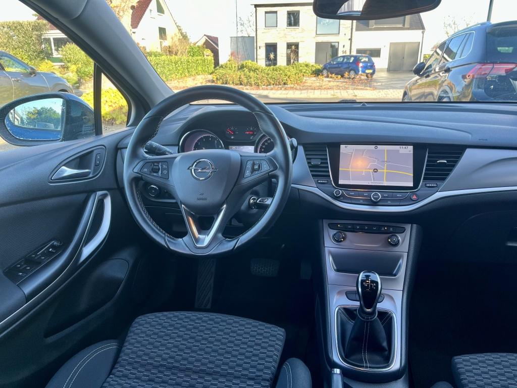 Opel Astra 1.0 105PK Online Edition Automaat Camera Navigati, Auto's, Gebruikt, Blauw, 610 kg, 23 km/l