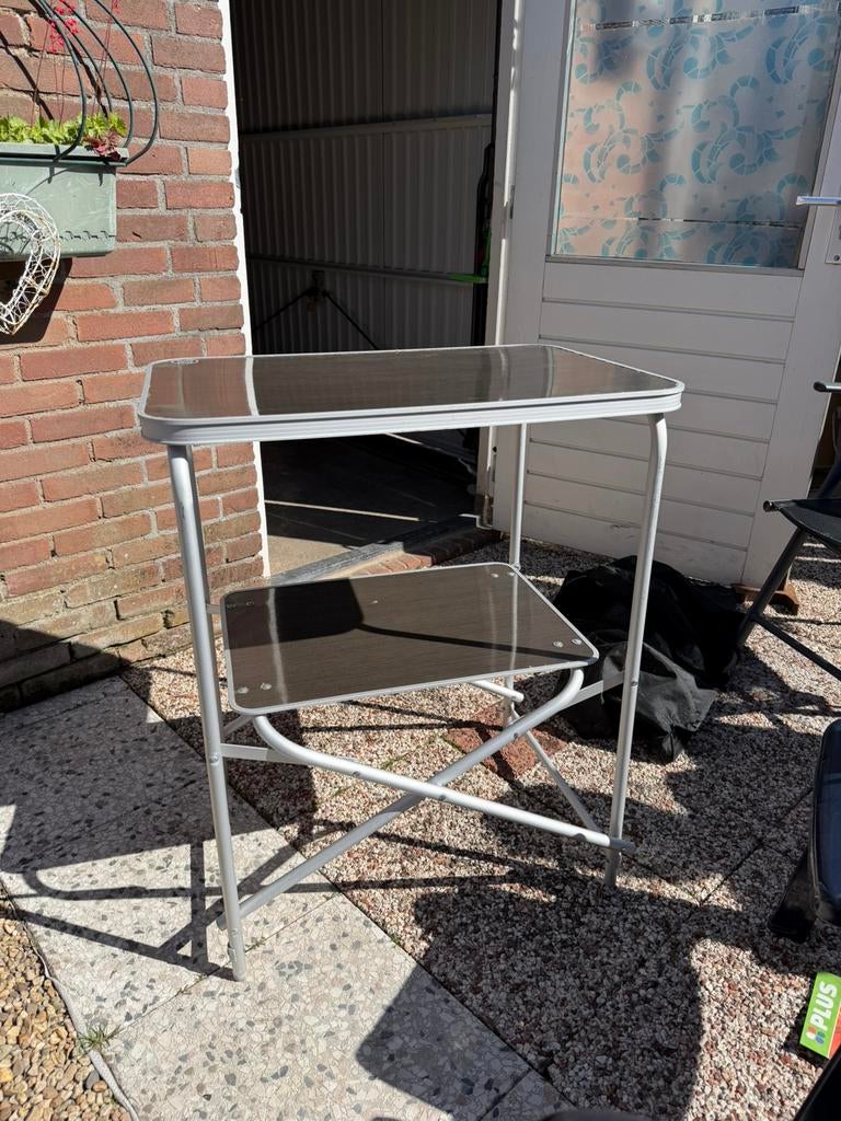 Camping tafel+ foudraal, Ophalen