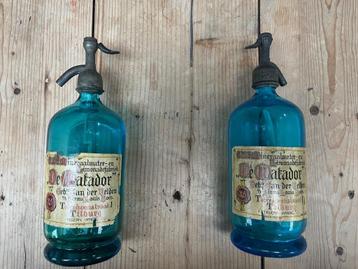 2 antieke blauwe sifon of soda flessen "De Matador" Tilburg  beschikbaar voor biedingen