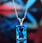 Mooie 18K witgoud verguld kettinghanger met blauw zirkoon, Nieuw, Ophalen of Verzenden, Met edelsteen, Zilver