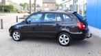 Skoda Fabia Combi 1.2 TSI Ambition met vaste trekhaak, Voorwielaandrijving, Euro 5, Gebruikt, Zwart