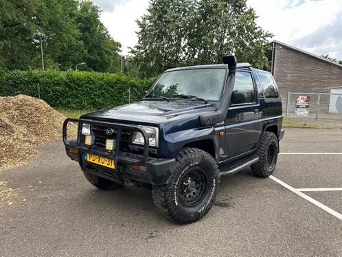 Daihatsu Feroza 1.6 Cabriotop 4WD 1996 Blauw, Auto's, Daihatsu, Bedrijf, Feroza, 4x4, Mistlampen, Open dak, Radio, Trekhaak, Benzine